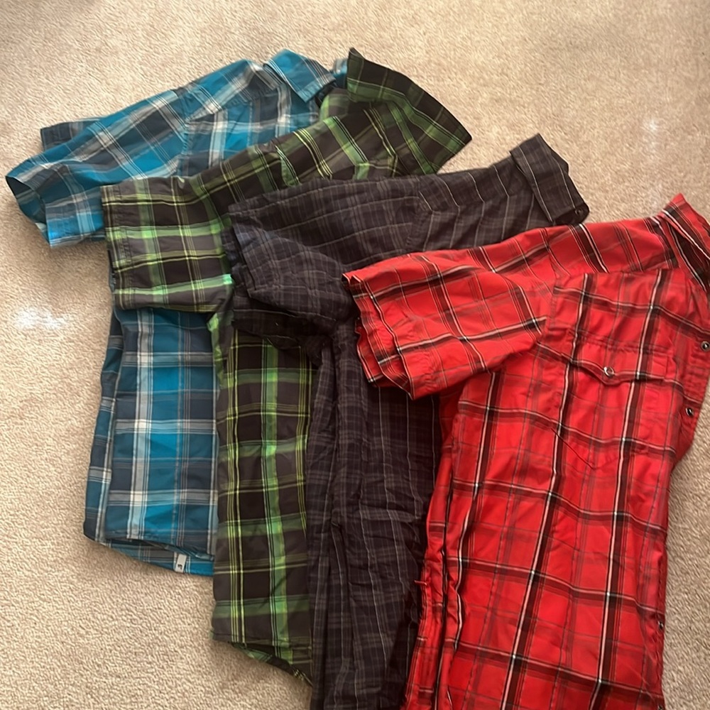 Four men's Navara cycling shirts, size large